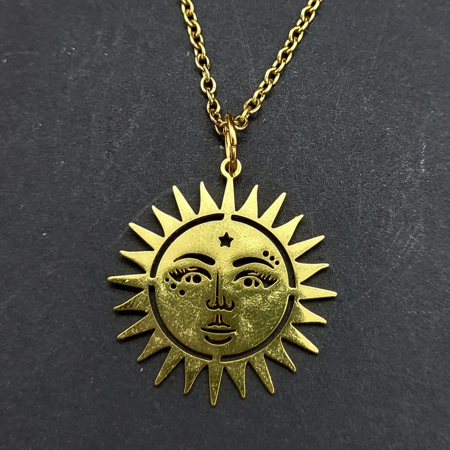 Goldcoloured sun or moon Necklaces