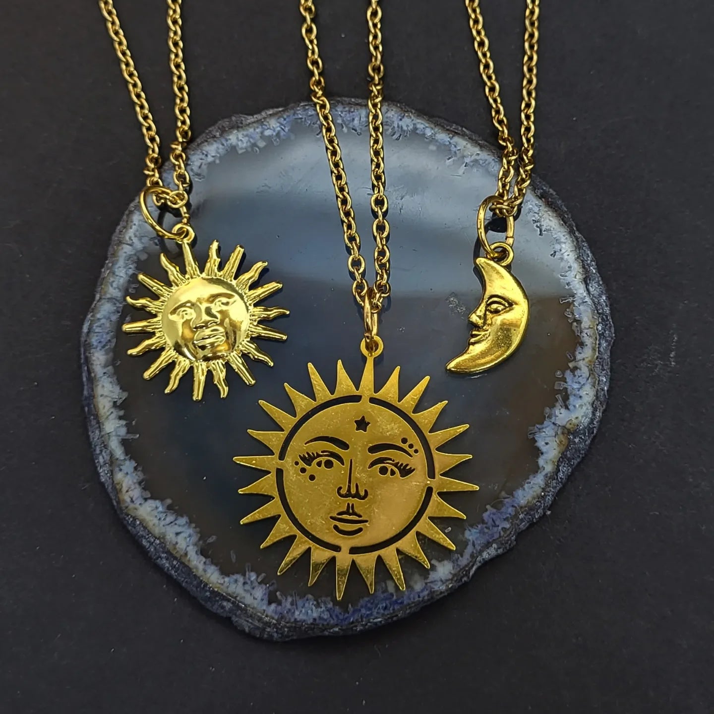 Goldcoloured sun or moon Necklaces