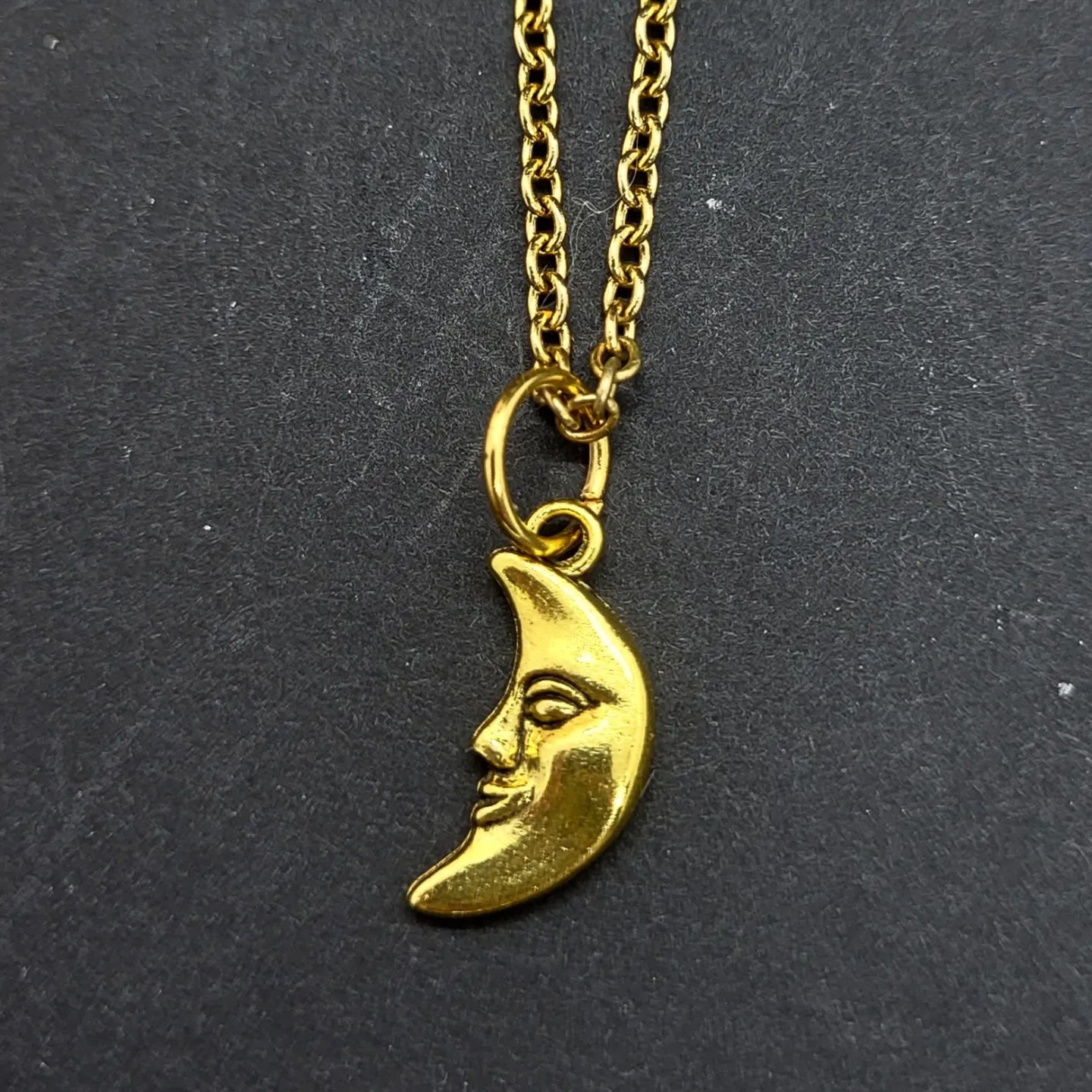 Goldcoloured sun or moon Necklaces