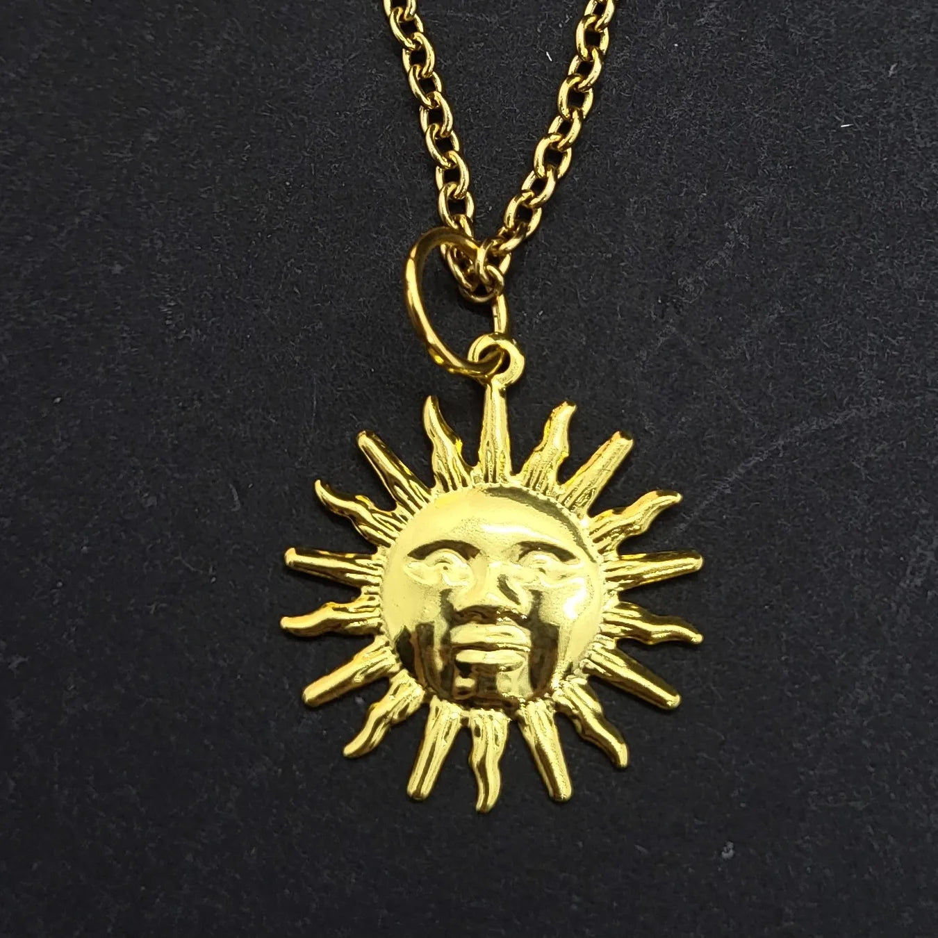 Goldcoloured sun or moon Necklaces